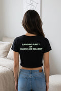 Surviving purely on snacks and delusion crop T shirt